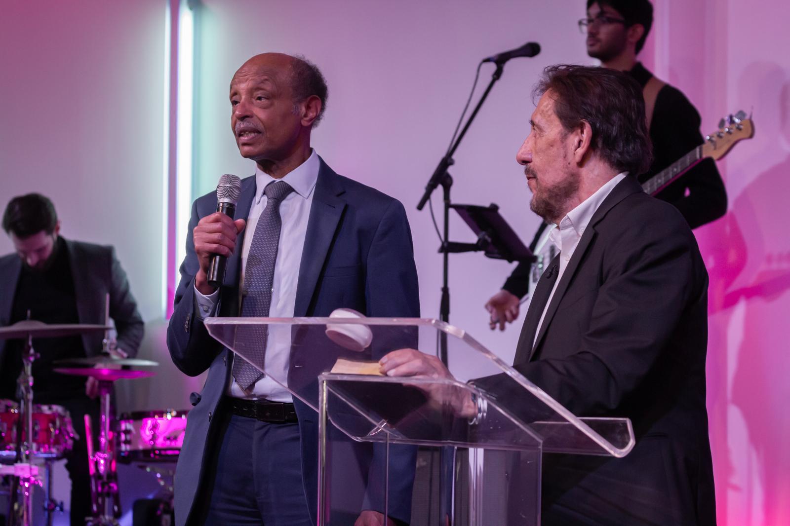 Dr. Sharief Ibrahim preaching at Cornerstone, with Pastor Chris alongside