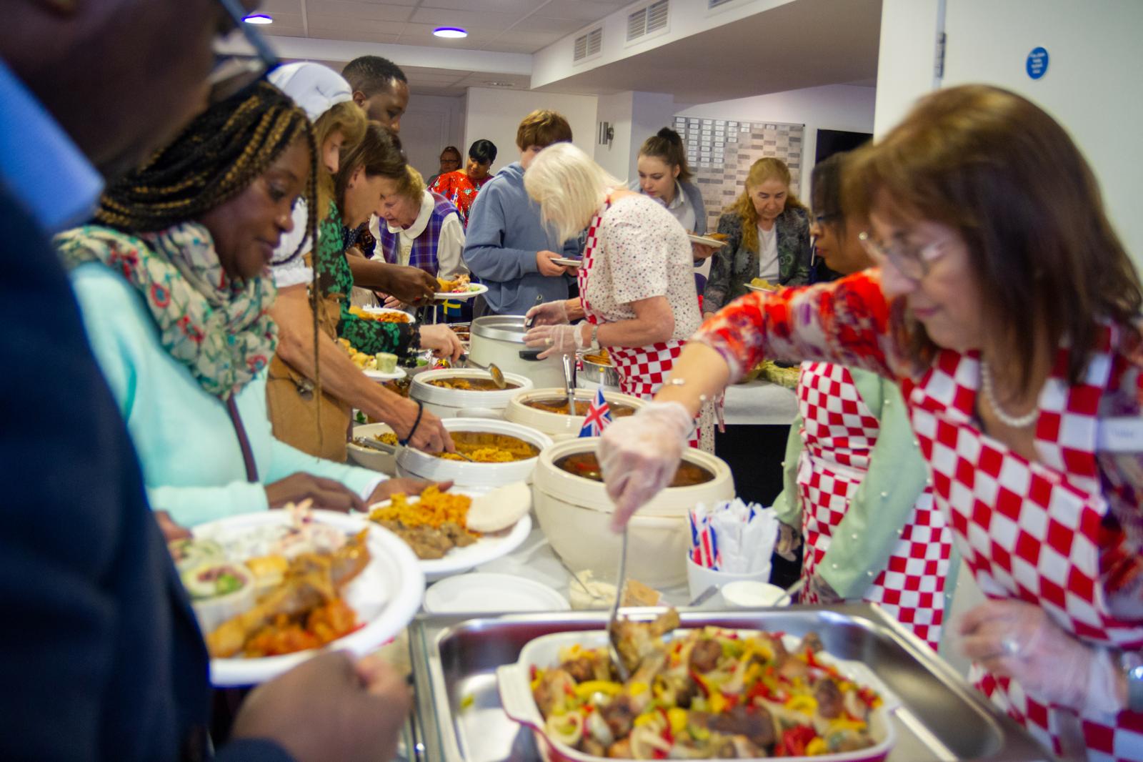 Cornerstone hospitality team serving food after a Sunday service